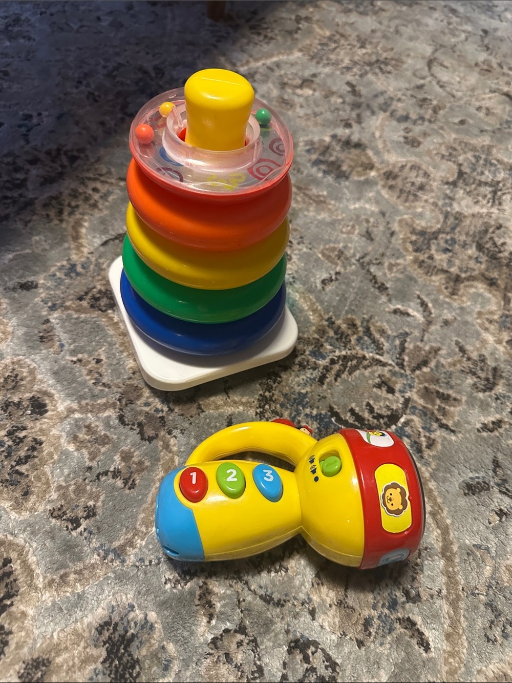 Stacking Ring Tower Toy and spin and learn flash light- Multicolor